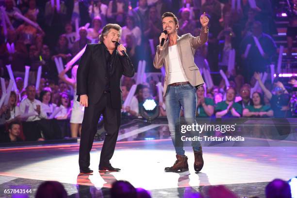 Austrian singer Andy Borg and german moderator Florian Silbereisen during the show 'Schlagercountdown - Das grosse Premierenfest' at EWE Arena on...