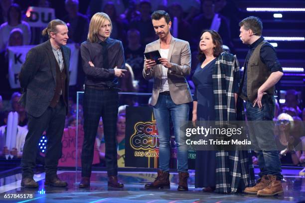 Joey Kelly, John Kelly, Kathy Kelly and Jimmy Kelly of the band 'The Kelly Family' and german moderator Florian Silbereisen during the show...