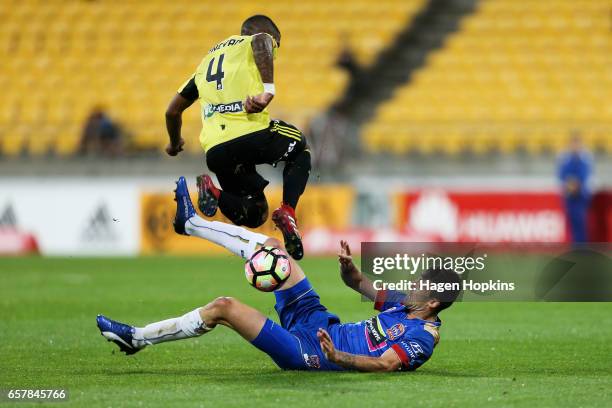 Jason Hoffman of the Jets wins the ball from Roly Bonevacia of the Phoenix during the round 24 A-League match between Wellington Phoenix and...