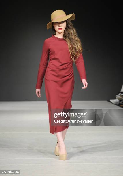 Model walks the runway wearing Jemmila at Vancouver Fashion Week Fall/Winter 2017 at Chinese Cultural Centre of Greater Vancouver on March 25, 2017...