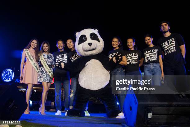 Mascot Chi-chi the panda with the hosts of the 2017 Earth Hour at the Mall of Asia in Pasay City. The 10th year anniversary of the one hour switch...