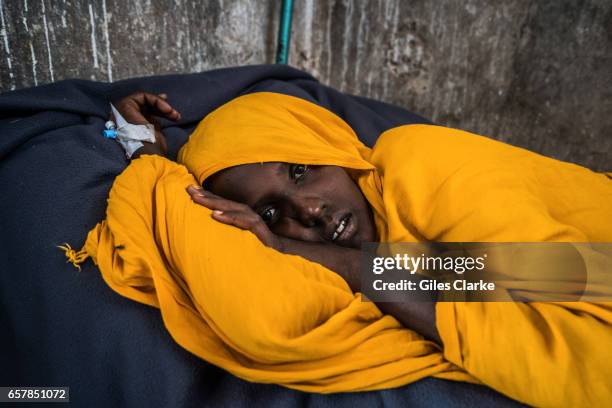 March 8, 2017: A cholera-stricken woman in a former prison in Wajid, Somalia. Somalia is in the grip of an intense drought, induced by consecutive...