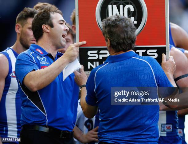 Brad Scott, Senior Coach of the Kangaroos addresses his players during the 2017 AFL round 01 match between the North Melbourne Kangaroos and the West...