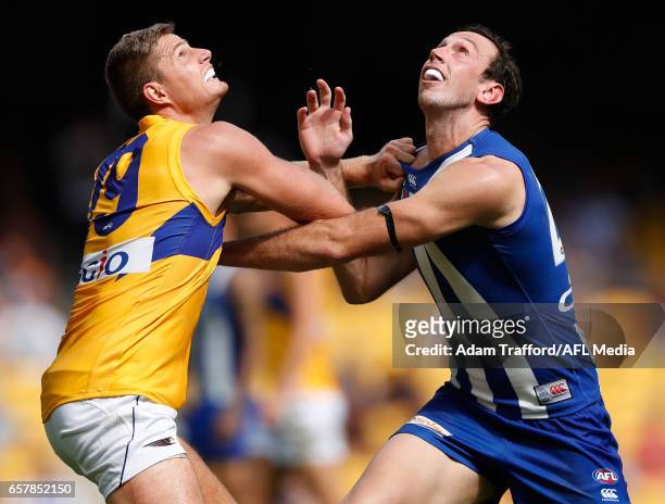 Todd Goldstein of the Kangaroos and Nathan Vardy of the Eagles compete in a ruck contest during the 2017 AFL round 01 match between the North...