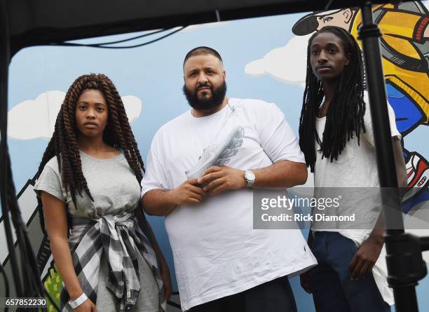 Khaled and young adults attend Champs Sports x DJ Khaled Game On Air Event In Atlanta at Maynard H. Jackson High School on March 25, 2017 in Atlanta,...