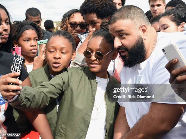 Khaled and young adults attend Champs Sports x DJ Khaled Game On Air Event In Atlanta at Maynard H. Jackson High School on March 25, 2017 in Atlanta,...