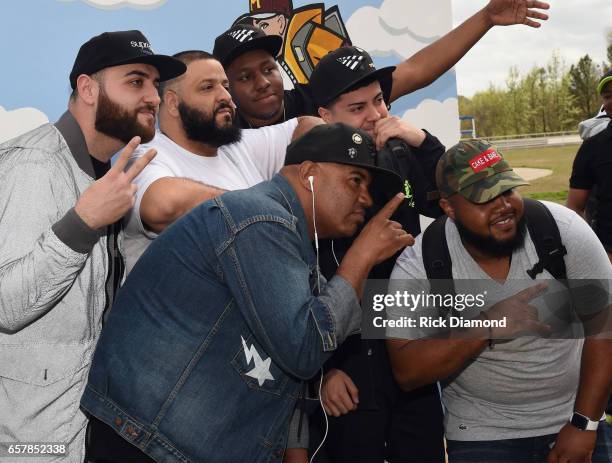 Khaled and young adults attend Champs Sports x DJ Khaled Game On Air Event In Atlanta at Maynard H. Jackson High School on March 25, 2017 in Atlanta,...