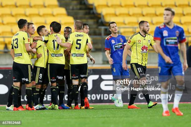 Phoenix players celebrate the goal of Gui Finkler during the round 24 A-League match between Wellington Phoenix and Newcastle Jets at Westpac Stadium...