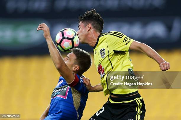 Aleksandr Kokko of the Jets and Marco Rossi of the Phoenix compete for a header during the round 24 A-League match between Wellington Phoenix and...