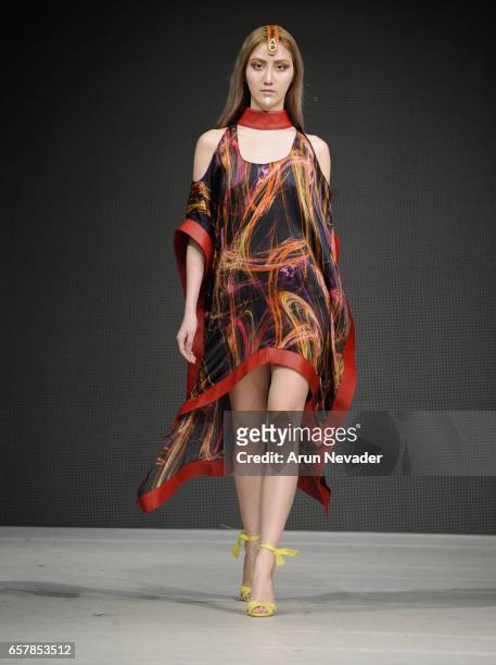 Model walks the runway wearing Pierrot by Emma Viedma at Vancouver Fashion Week Fall/Winter 2017 at Chinese Cultural Centre of Greater Vancouver on...