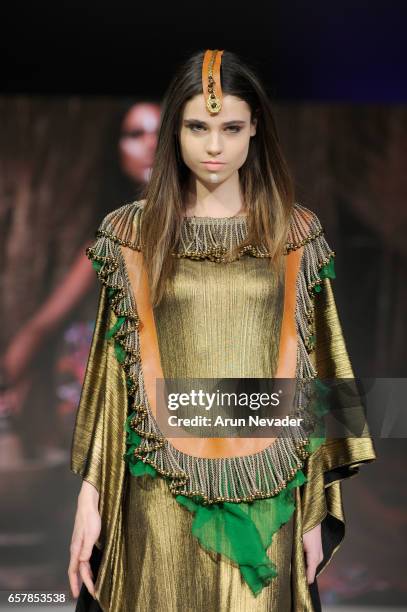 Model walks the runway wearing Pierrot by Emma Viedma at Vancouver Fashion Week Fall/Winter 2017 at Chinese Cultural Centre of Greater Vancouver on...