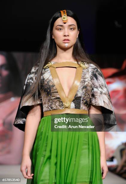 Model walks the runway wearing Pierrot by Emma Viedma at Vancouver Fashion Week Fall/Winter 2017 at Chinese Cultural Centre of Greater Vancouver on...