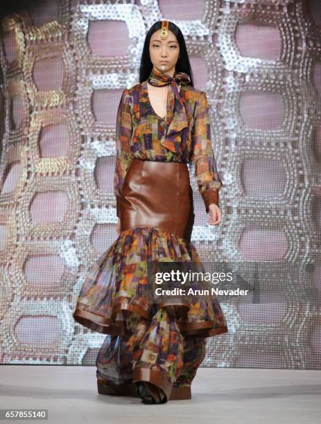 Model walks the runway wearing Pierrot by Emma Viedma at Vancouver Fashion Week Fall/Winter 2017 at Chinese Cultural Centre of Greater Vancouver on...