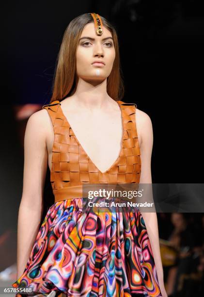 Model walks the runway wearing Pierrot by Emma Viedma at Vancouver Fashion Week Fall/Winter 2017 at Chinese Cultural Centre of Greater Vancouver on...