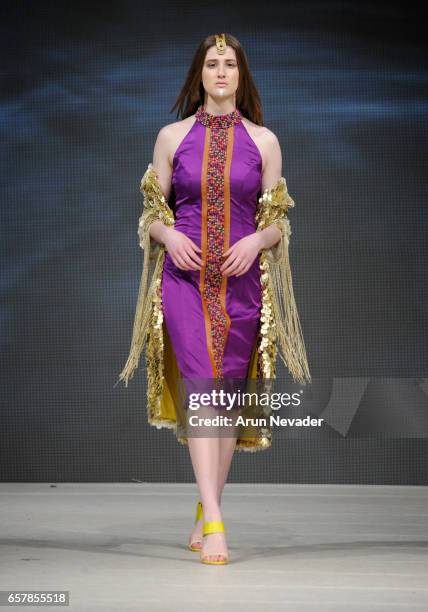 Model walks the runway wearing Pierrot by Emma Viedma at Vancouver Fashion Week Fall/Winter 2017 at Chinese Cultural Centre of Greater Vancouver on...