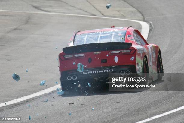 Debris flies out of the back of the Florida Watermelon Association Chevrolet driven by Ross Chastain causing a caution flag to be raised during the...