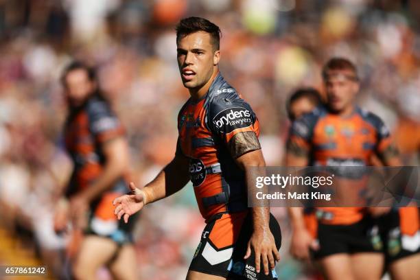 Luke Brooks of the Tigers looks on during the round four NRL match between the Wests Tigers and the Melbourne Storm at Leichhardt Oval on March 26,...