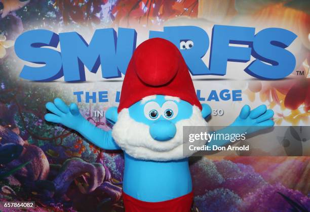 A model dressed as Pappa Smurf arrives ahead of the SMURFS: The Lost Village Sydney Premiere on March 26, 2017 in Sydney, Australia.
