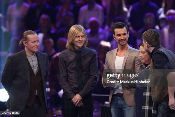 Joey Kelly, John Kelly, Kathy Kelly and Jimmy Kelly of the band 'The Kelly Family' and german moderator Florian Silbereisen during the show...