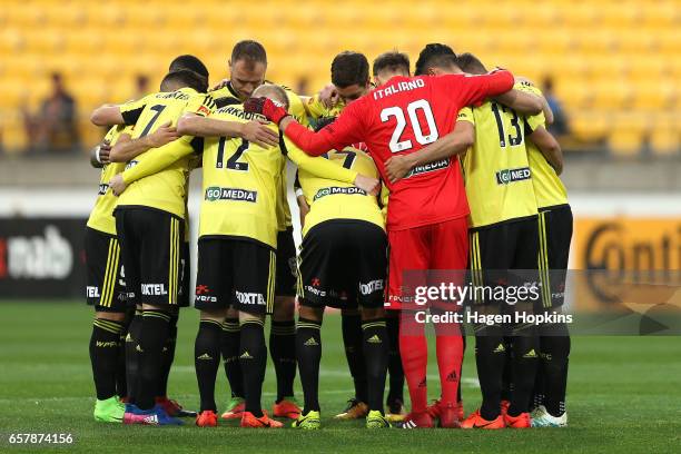 Phoenix players form a team huddle during the round 24 A-League match between Wellington Phoenix and Newcastle Jets at Westpac Stadium on March 26,...