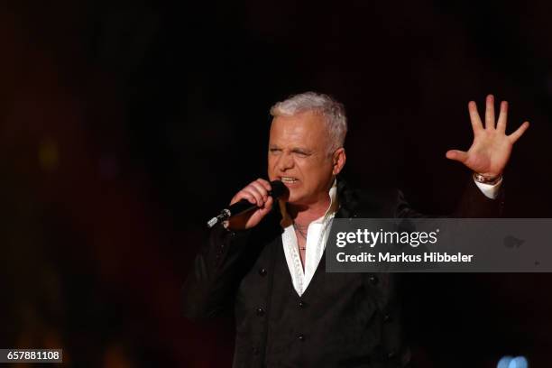 German singer Nino de Angelo performs during the show 'Schlagercountdown - Das grosse Premierenfest' at EWE Arena on March 25, 2017 in Oldenburg,...