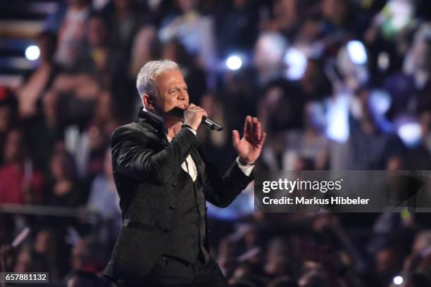 German singer Nino de Angelo performs during the show 'Schlagercountdown - Das grosse Premierenfest' at EWE Arena on March 25, 2017 in Oldenburg,...