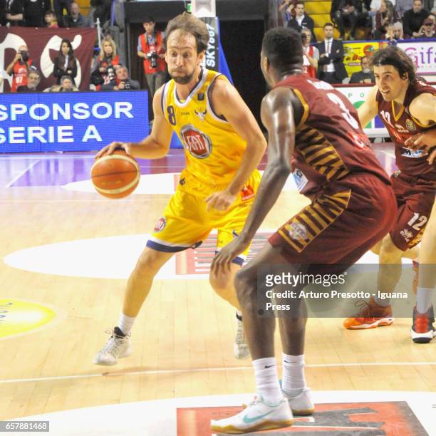 Giuseppe Poeta of Fiat competes with Melvin Ejim and Ariel Filloy of Umana during the LegaBasket LBA of Serie A1 match between Reyer Umana Venezia...