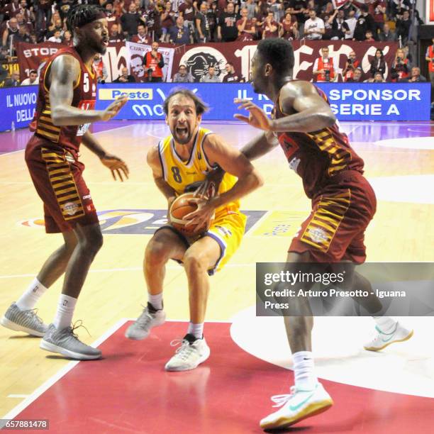 Giuseppe Poeta of Fiat competes with Julyan Stone and Melvin Ejim of Umana during the LegaBasket LBA of Serie A1 match between Reyer Umana Venezia...