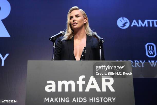 Charlize Theron speaks during the amfAR Hong Kong Gala 2017 at Shaw Studios on March 25, 2017 in Hong Kong, Hong Kong.