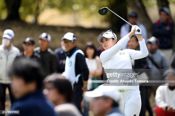 Asuka Kashiwabara of Japan hits her tee shot on the 5th hole during the final round of the AXA Ladies Golf Tournament at the UMK Country Club on...