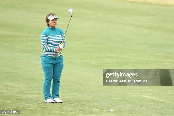 Ai Suzuki of Japan lines up her third shot on the 18th hole during the final round of the AXA Ladies Golf Tournament at the UMK Country Club on March...