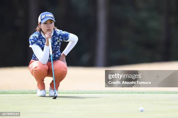 Maiko Wakabayashi of Japan lines up her birdie putt on the 11th hole during the final round of the AXA Ladies Golf Tournament at the UMK Country Club...