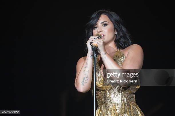 Demi Lovato performs onstage during BeautyKind Unites: Concert for Causes at AT&T Stadium on March 25, 2017 in Arlington, Texas.