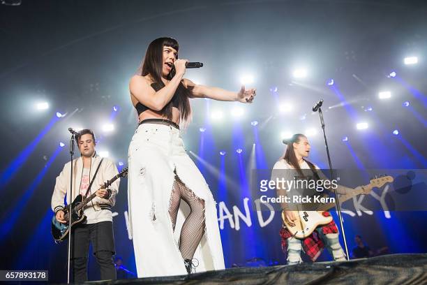 Neil Perry, Kimberly Perry, and Reid Perry of The Band Perry perform onstage during BeautyKind Unites: Concert for Causes at AT&T Stadium on March...