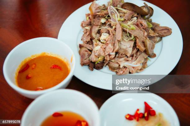 enjoy special goat meat in ninh binh - glutamina imagens e fotografias de stock