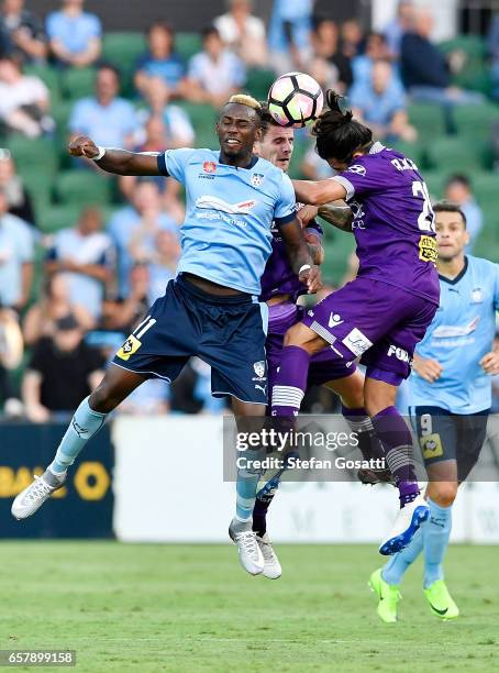 Bernie Ibini of Sydney FC and Aryn Williams of the Glory contest the ball during the round 24 A-League match between Perth Glory and Sydney FC at nib...