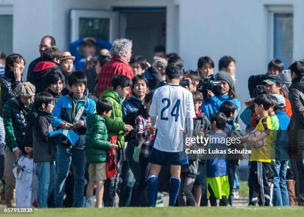 Takefusa Kubo of Japan is seen with fans after a Friendly Match between MSV Duisburg and the U20 Japan on March 26, 2017 in Duisburg, Germany.