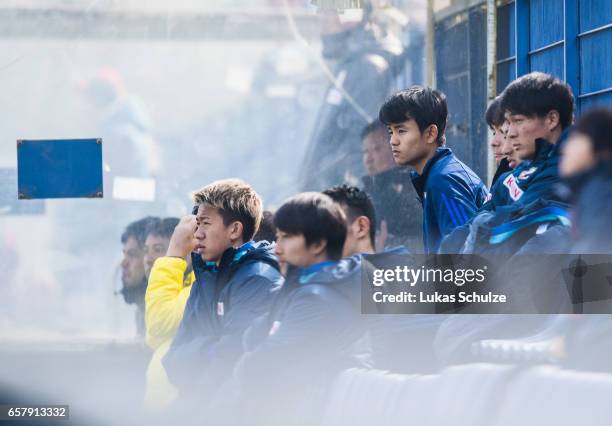 Takefusa Kubo of Japan sits on the bench during a Friendly Match between MSV Duisburg and the U20 Japan on March 26, 2017 in Duisburg, Germany.