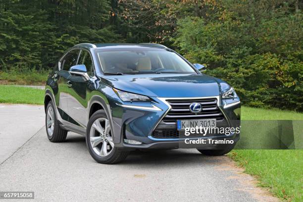 hybrid suv lexus nx on the road - lexus rx stock pictures, royalty-free photos & images