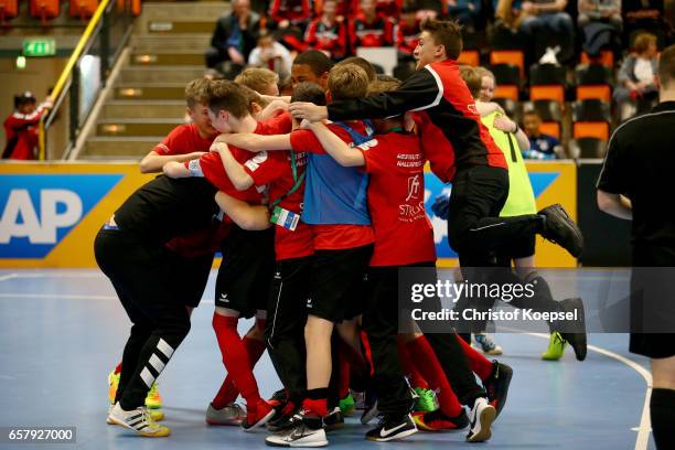 The team of SpVg Brakel celebrates winning the thrid place match Junior C between Hertha BSC Berlin and SpVg Brakel 5-6 after penalty shoot-out of...