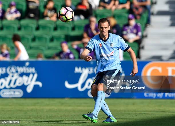 Alex Wilkinson of Sydney FC kicks the ball during the round 24 A-League match between Perth Glory and Sydney FC at nib Stadium on March 26, 2017 in...