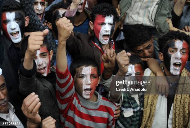 Houthis and supporters of ousted leader Ali Abdullah Saleh gather to protest the Saudi-led operations during a rally on the second anniversary of the...