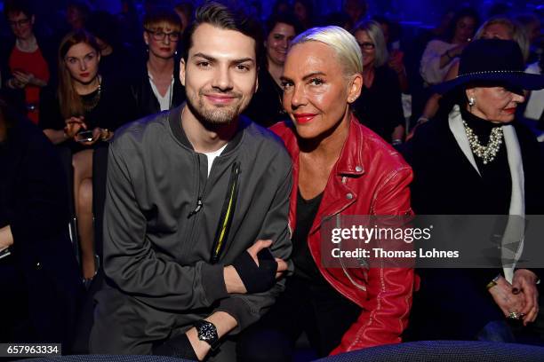 Jimi Blue Ochsenknecht and Natascha Ochsenknecht, wearing SOCCX, attend the s.Oliver THE FUSION COLLECTION Fashion Show at Festhalle on March 25,...