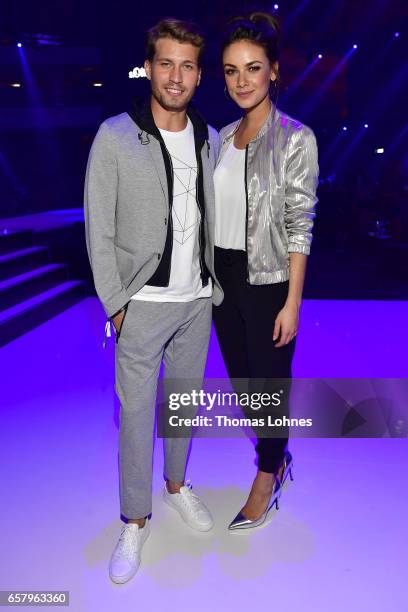 Raul Richter and Janina Uhse attend the s.Oliver THE FUSION COLLECTION Fashion Show at Festhalle on March 25, 2017 in Frankfurt am Main, Germany.