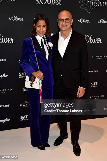 Rabea Schif and CEO Armin Fichtel attend the s.Oliver THE FUSION COLLECTION Fashion Show at Festhalle on March 25, 2017 in Frankfurt am Main, Germany.