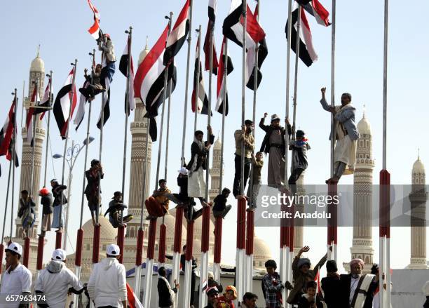 Houthis and supporters of ousted leader Ali Abdullah Saleh gather to protest the Saudi-led operations during a rally on the second anniversary of the...