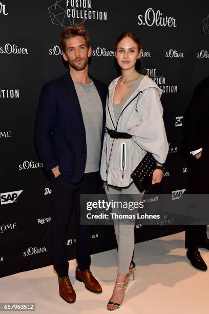 Ben Dahlhaus and Elena Carriere attend the s.Oliver THE FUSION COLLECTION Fashion Show at Festhalle on March 25, 2017 in Frankfurt am Main, Germany.