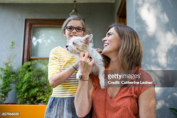 mother and daughter with dog - south pasadena california stock pictures, royalty-free photos & images