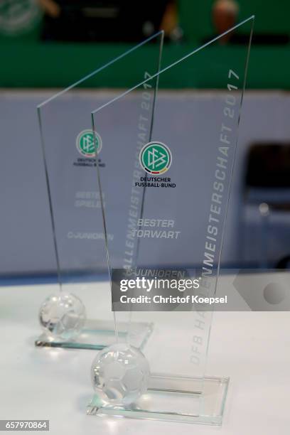 The trophy of the best player and best goalkeeper of the C Juniors German Indoor Football Championship are seen at Sporthalle West on March 26, 2017...