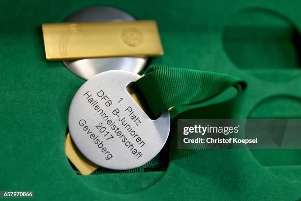 The gold medals are seen during the B and C Juniors German Indoor Football Championship at Sporthalle West on March 26, 2017 in Gevelsberg, Germany.